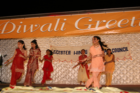 Children on-stage performing a traditional Indian dance during the Diwali Celebrations