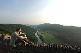 Man admiring the view across the Wye Valley and Forest of Dean